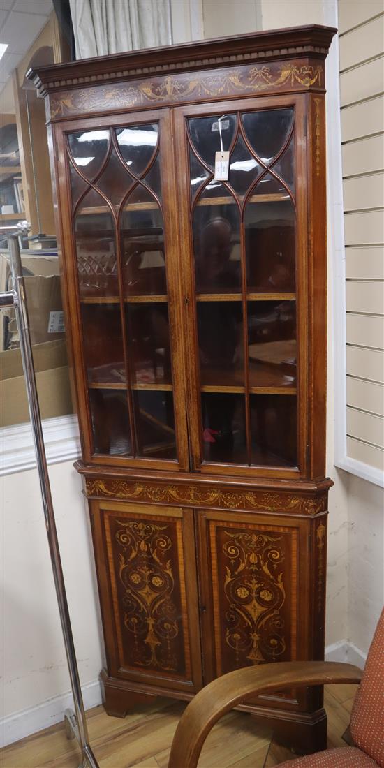 An Edwardian marquetry inlaid mahogany standing corner cupboard H.201cm